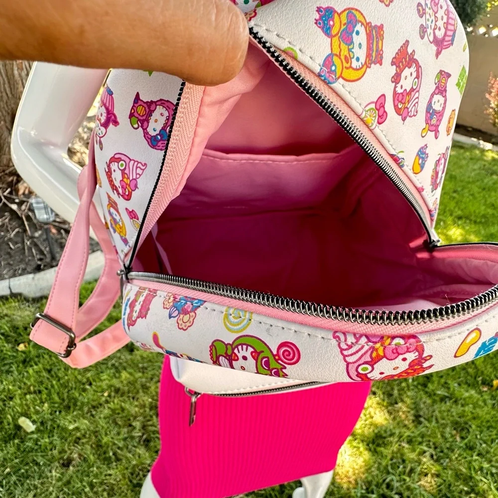 Loungefly Pink and White Kids Backpack